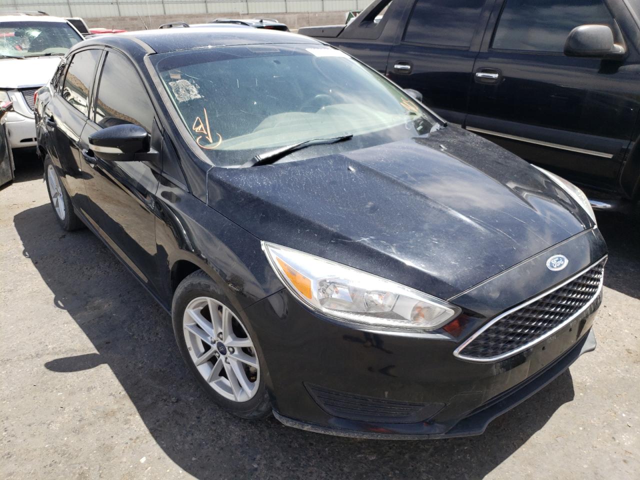 FORD FOCUS SE 2017 with VIN 1FADP3F29HL296482 - Photo from auction