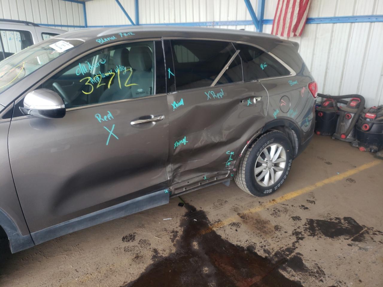 Photo 9 from auction – 2016 KIA SORENTO LX with VIN 5XYPG4A59GG014303