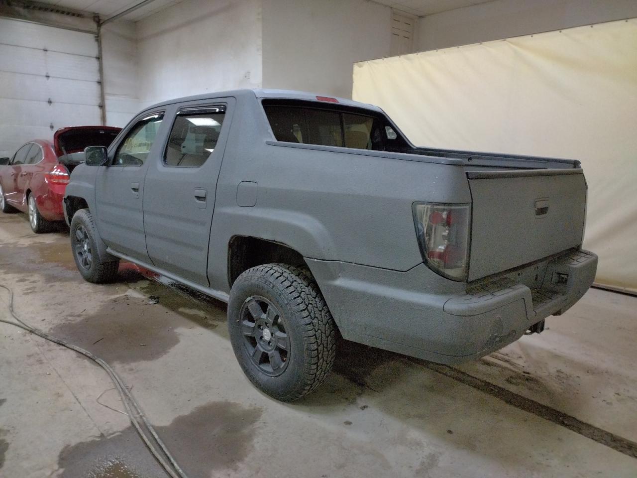 Photo 3 from auction – 2009 HONDA RIDGELINE with VIN 2HJYK16559H003552