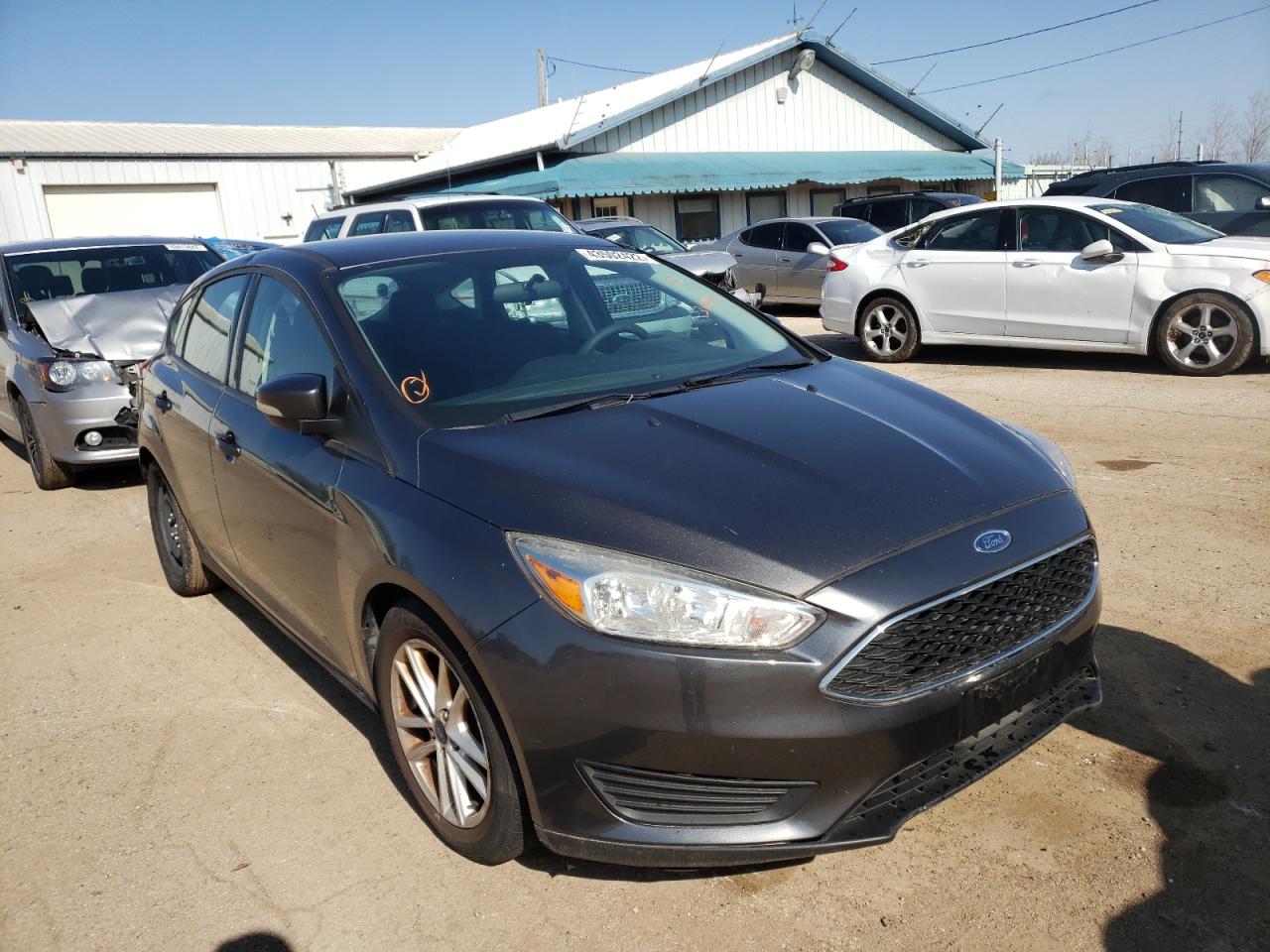 FORD FOCUS SE 2015 with VIN 1FADP3K26FL351473 - Photo from auction