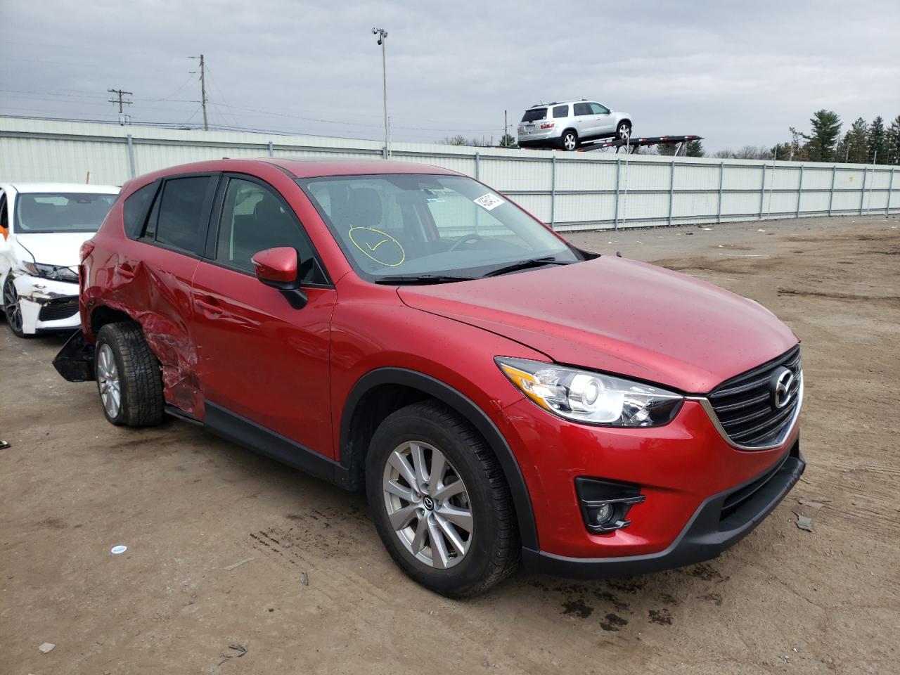 MAZDA CX-5 TOURI 2016 with VIN JM3KE4CY1G0828840 - Photo from auction