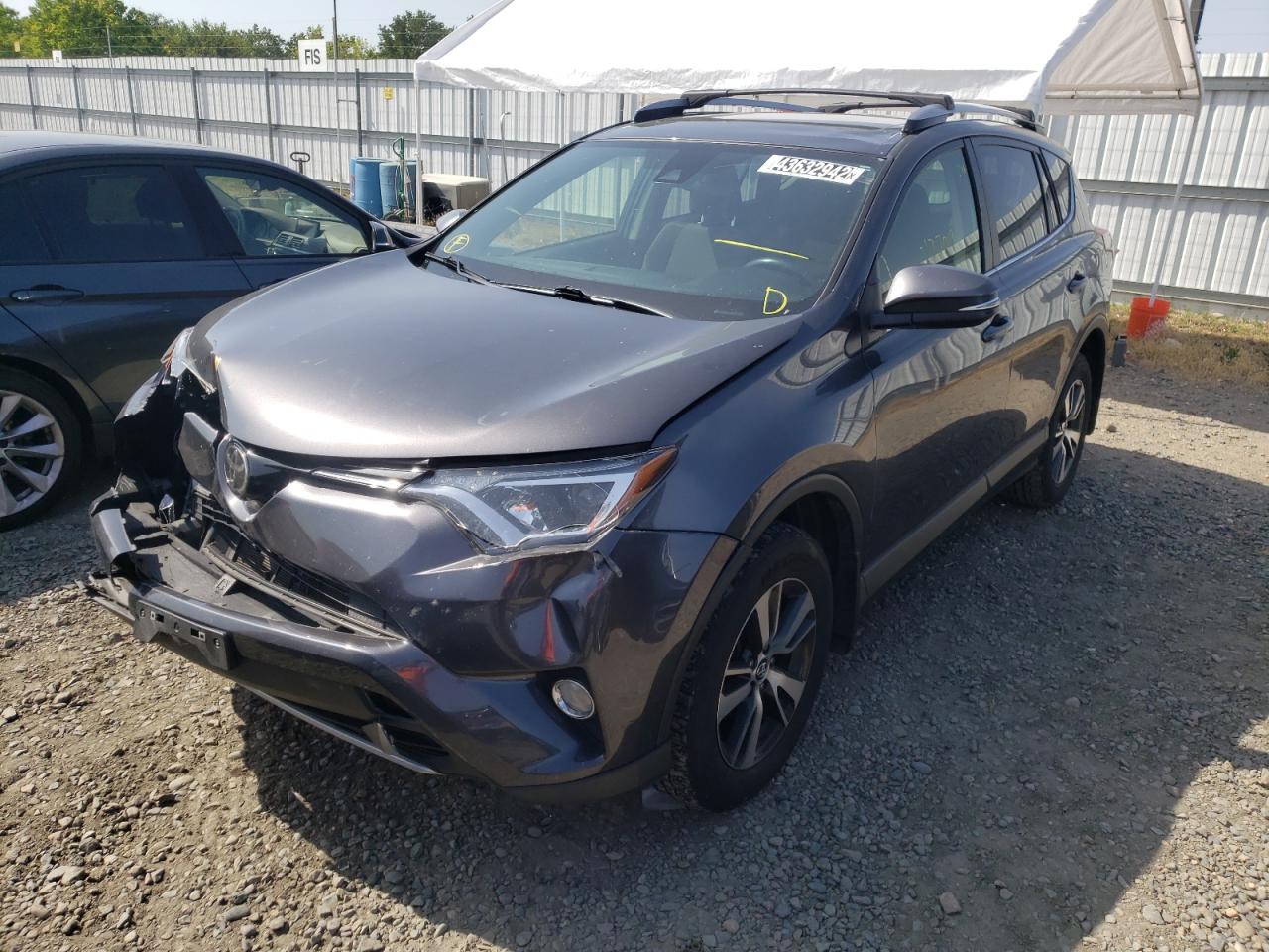 Photo 2 from auction – 2017 TOYOTA RAV4 XLE with VIN JTMRFREV9HJ710826