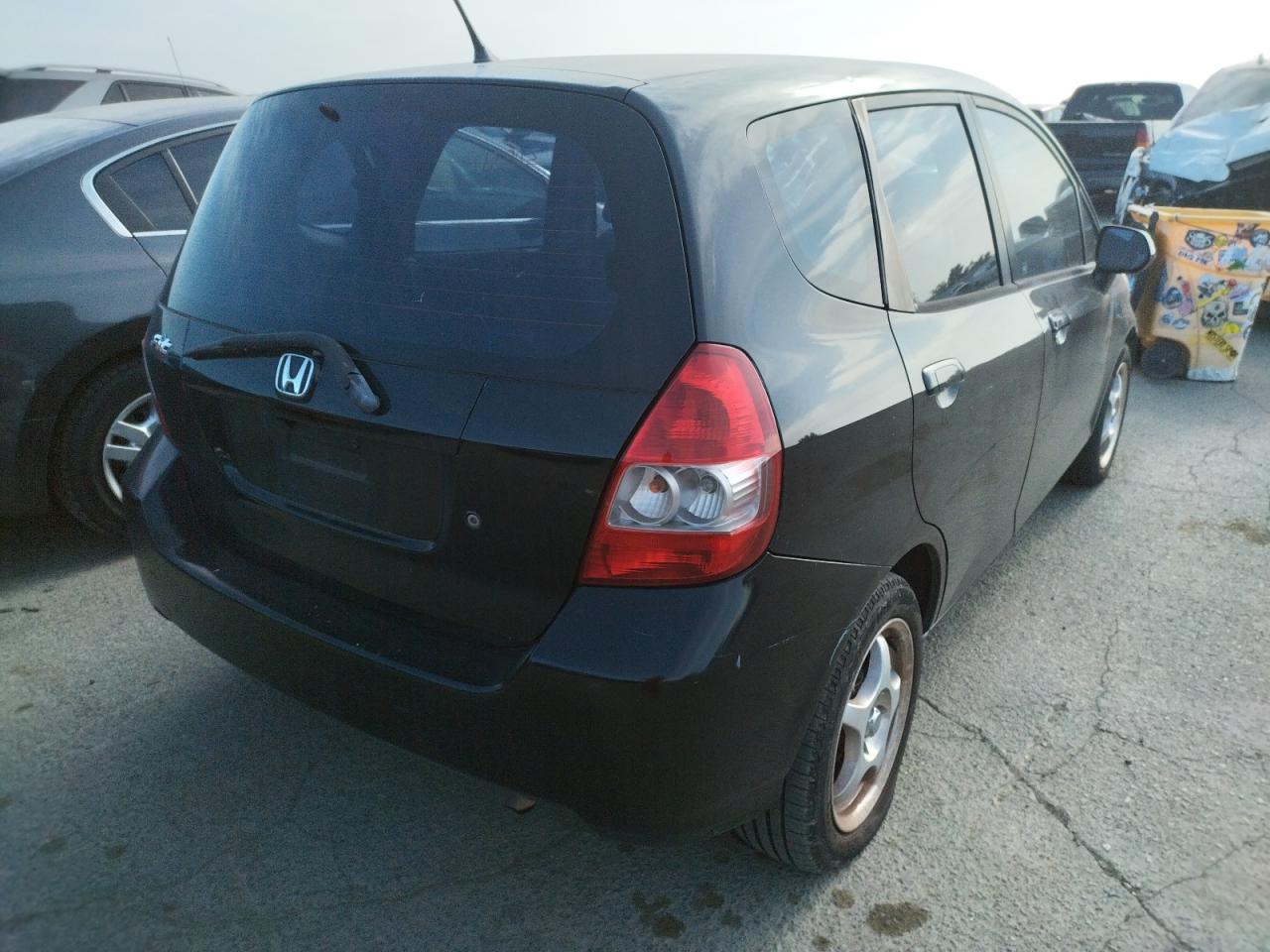 Photo 4 from auction – 2007 HONDA FIT with VIN JHMGD37417S044650