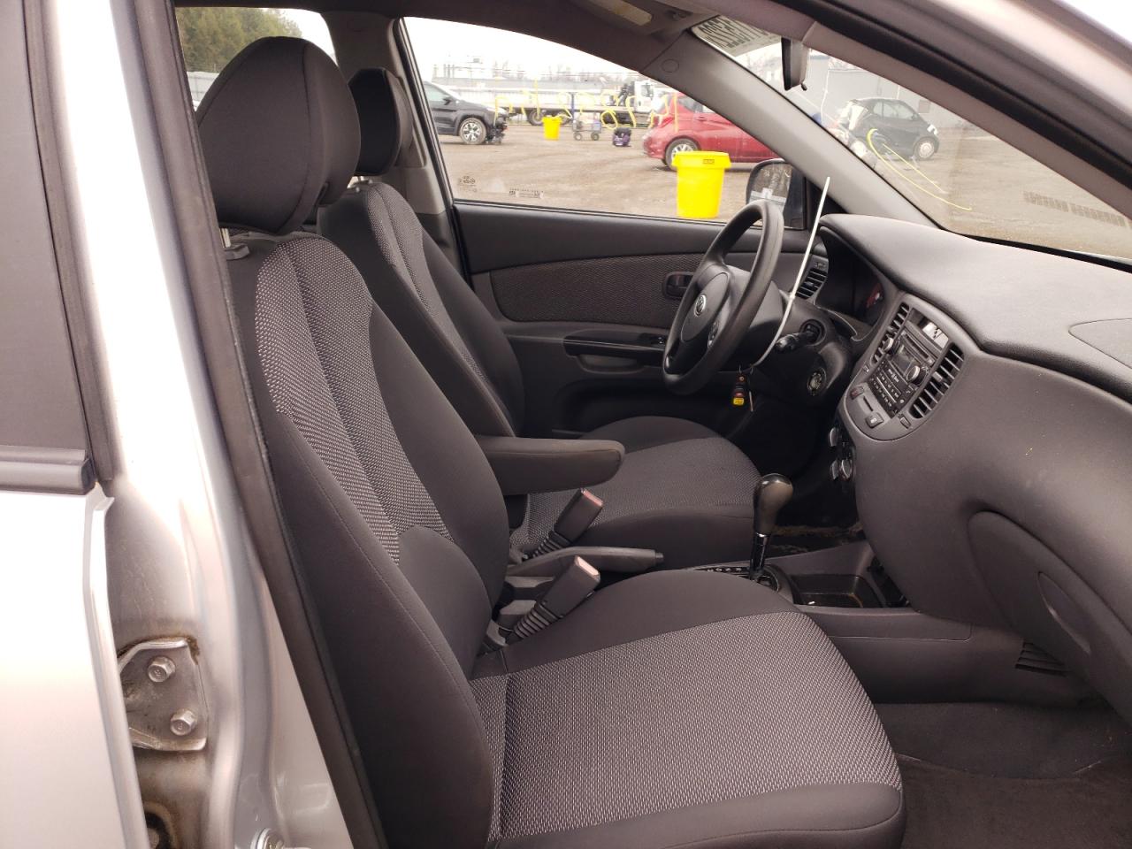 Photo 5 from auction – 2011 KIA RIO BASE with VIN KNADH4B33B6952142