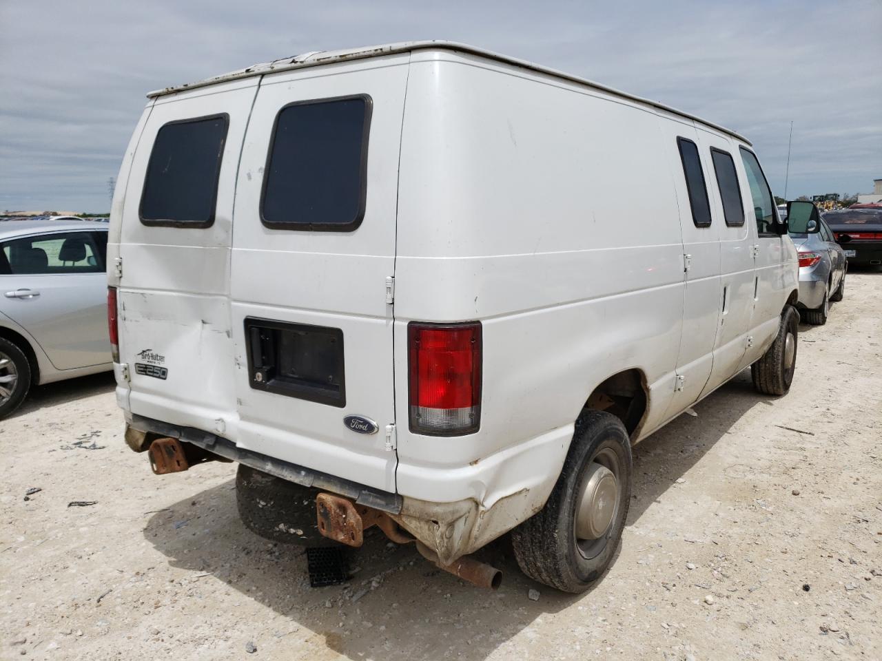 Photo 4 from auction – 1999 FORD ECONOLINE with VIN 1FTPE24L3XHC12015