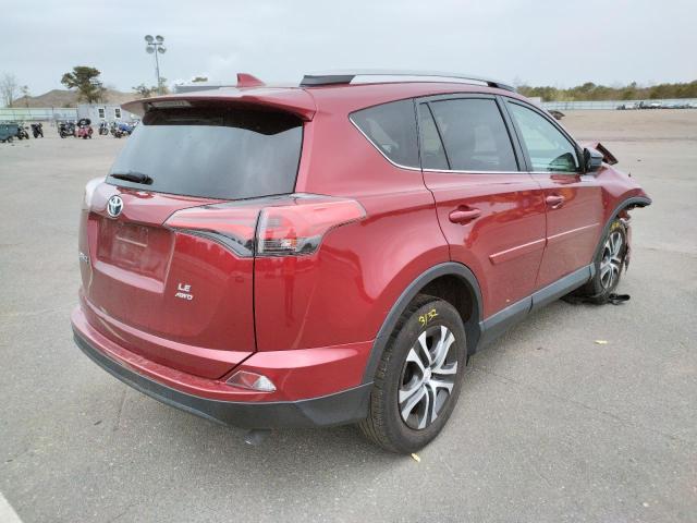Photo 4 from auction – 2018 TOYOTA RAV4 LE with VIN 2T3BFREV7JW743963