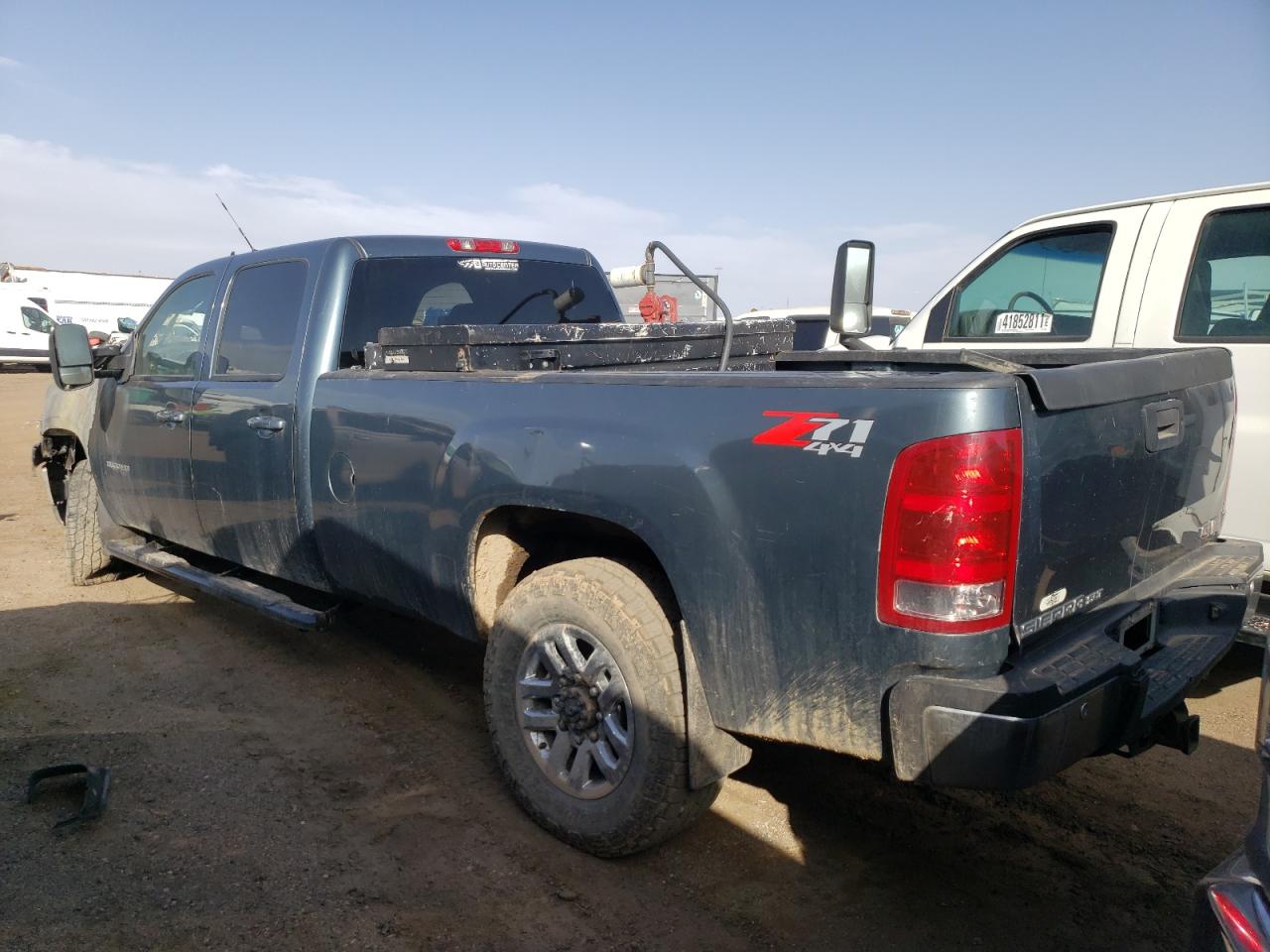 Photo 3 from auction – 2011 GMC SIERRA K35 with VIN 1GT424C88BF128796