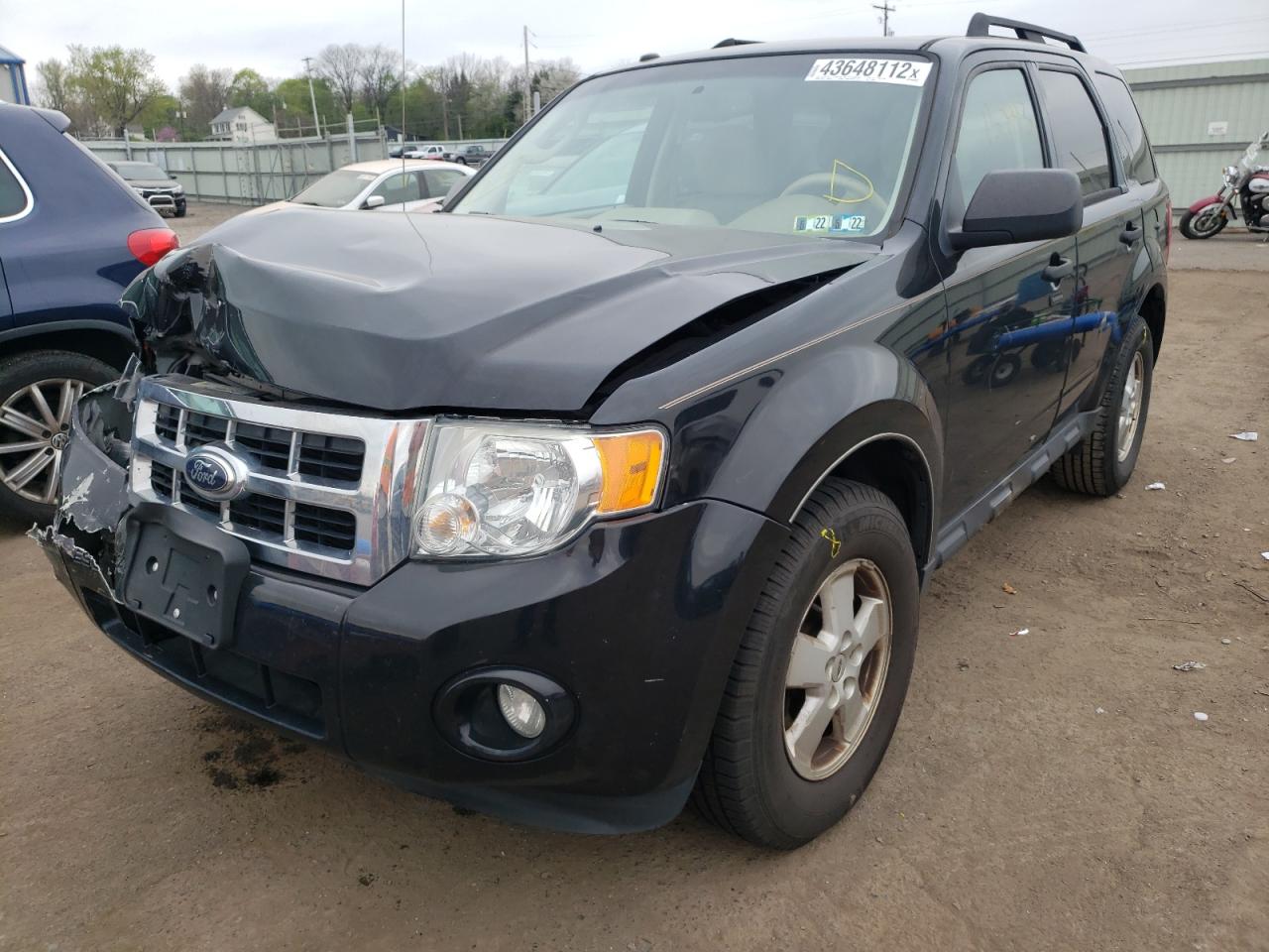 Photo 12 from auction – 2012 FORD ESCAPE XLT with VIN 1FMCU0D7XCKC74609