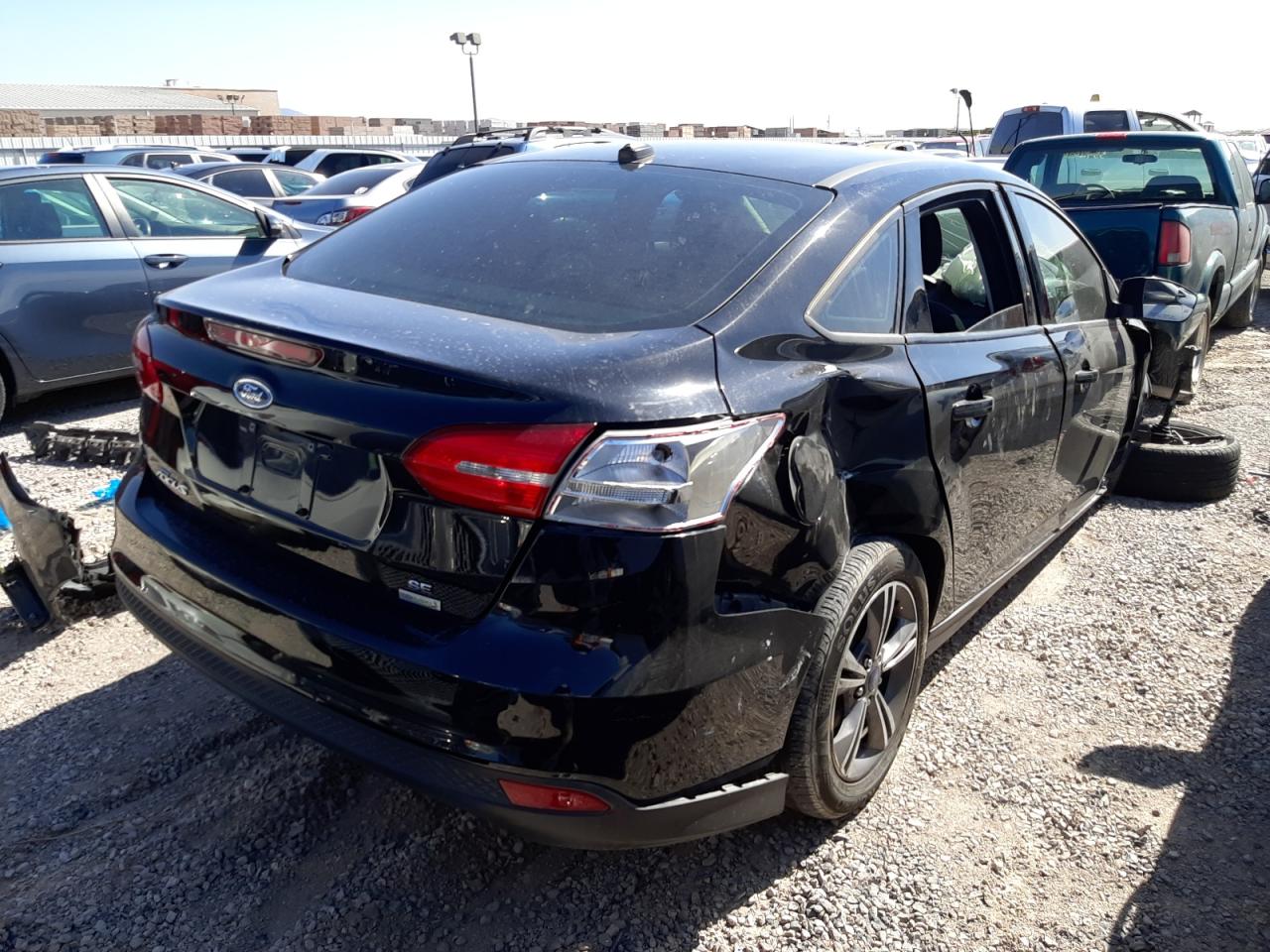 Photo 4 from auction – 2018 FORD FOCUS SE with VIN 1FADP3FE7JL203670