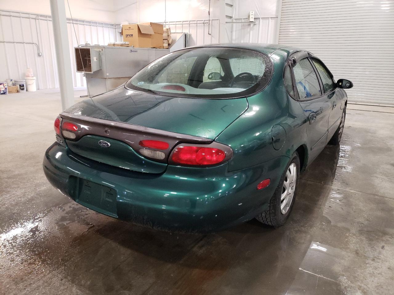 Photo 4 from auction – 1999 FORD TAURUS LX with VIN 1FAFP52UXXG306441