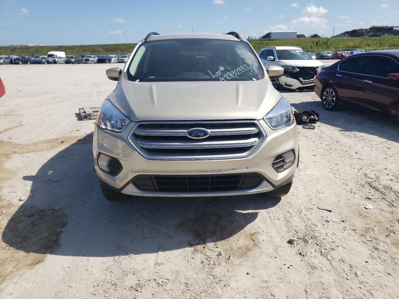Photo 9 from auction – 2018 FORD ESCAPE SE with VIN 1FMCU0GD7JUD42738