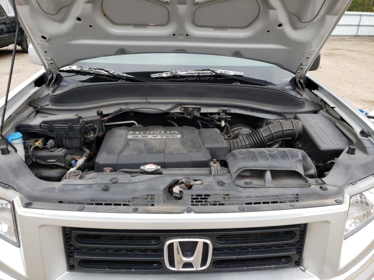 Photo 7 from auction – 2006 HONDA RIDGELINE with VIN 2HJYK16546H550100