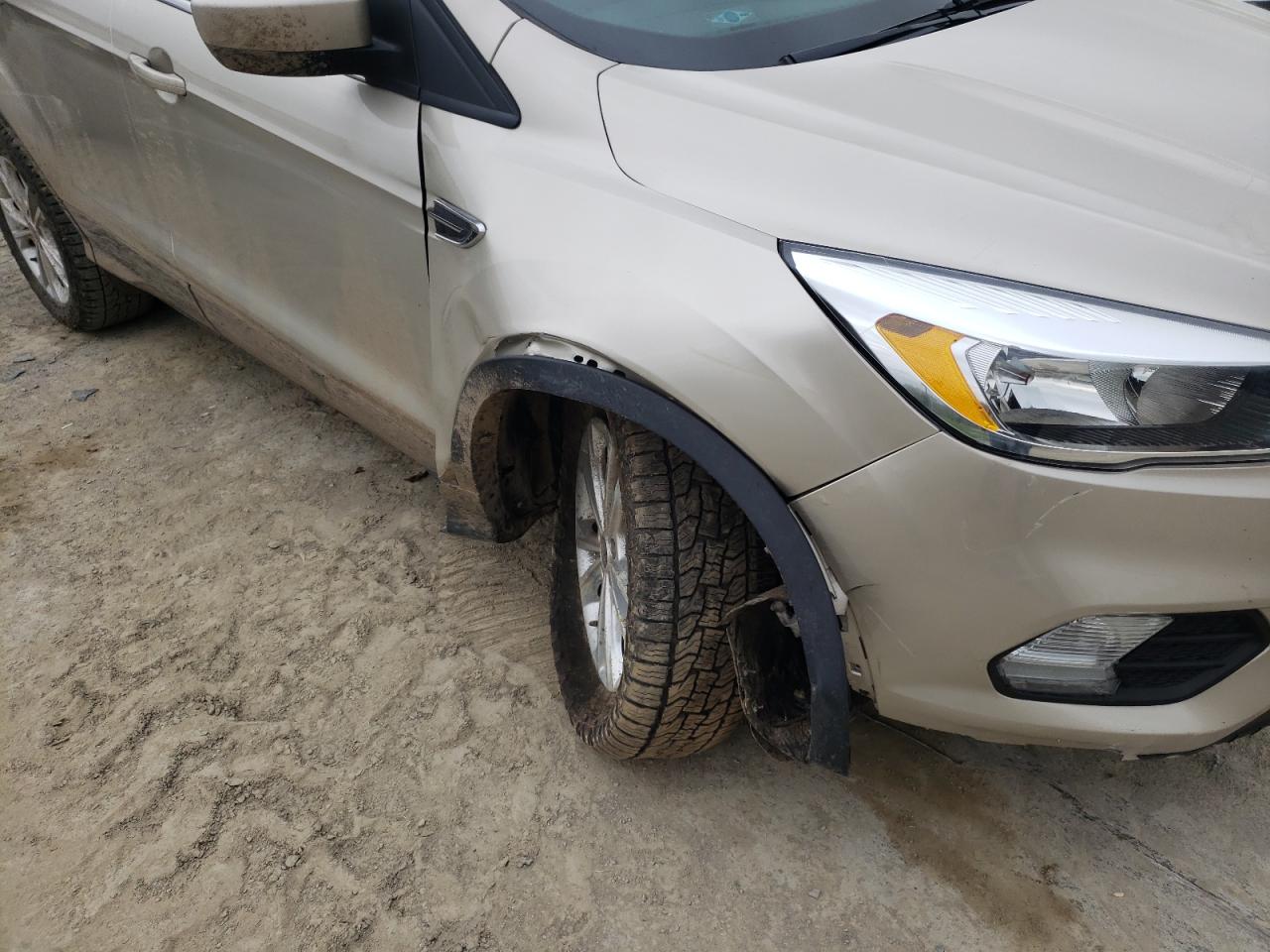 Photo 9 from auction – 2017 FORD ESCAPE SE with VIN 1FMCU9GD7HUB75893