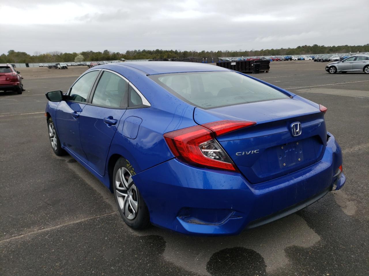 Photo 13 from auction – 2017 HONDA CIVIC LX with VIN 2HGFC2F51HH542653
