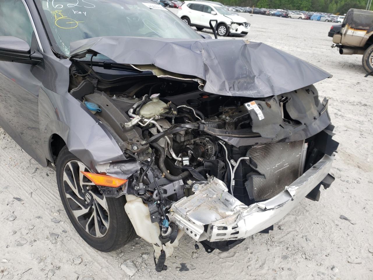 Photo 9 from auction – 2018 HONDA CIVIC LX with VIN 2HGFC4B03JH301625
