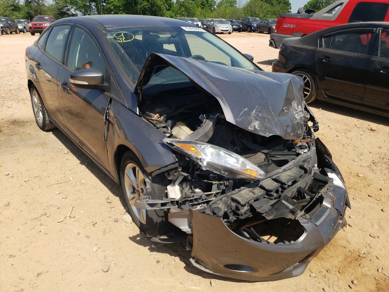 FORD FOCUS SE 2014 with VIN 1FADP3F22EL379022 - Photo from auction