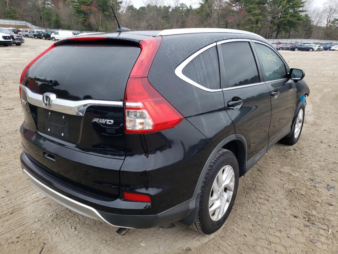 Photo 4 from auction – 2016 HONDA CR-V EXL with VIN 2HKRM4H75GH659662