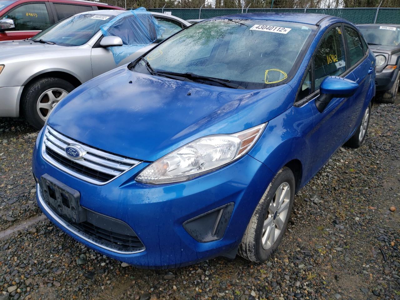 Photo 2 from auction – 2011 FORD FIESTA SE with VIN 3FADP4BJ9BM106799