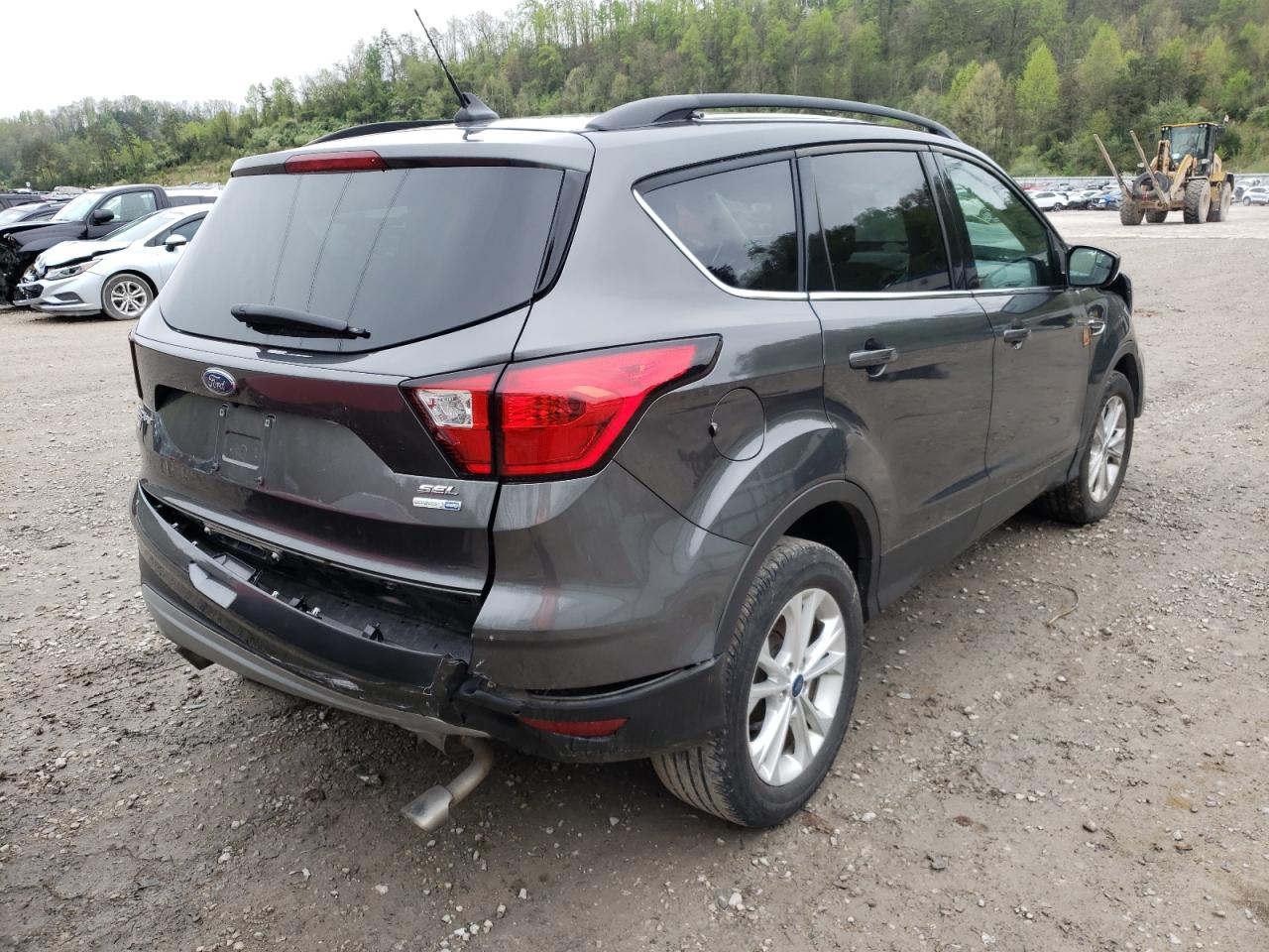 Photo 4 from auction – 2019 FORD ESCAPE SEL with VIN 1FMCU9HD1KUB76799