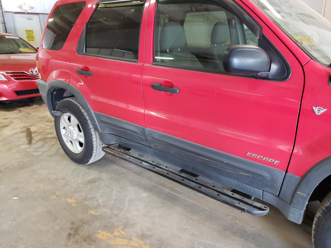 Photo 9 from auction – 2002 FORD ESCAPE XLT with VIN 1FMYU031X2KB14747