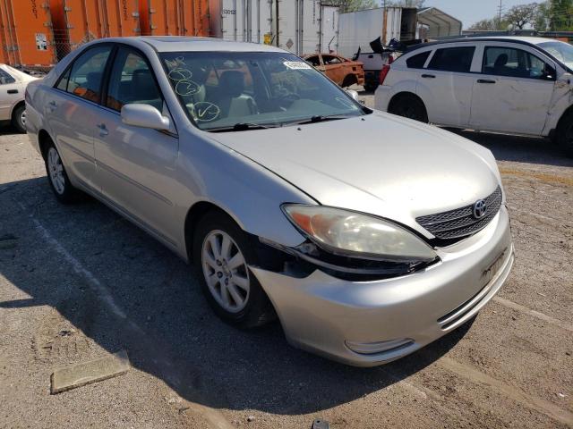 TOYOTA CAMRY LE 2002 with VIN 4T1BF30K52U027275 - Photo from auction