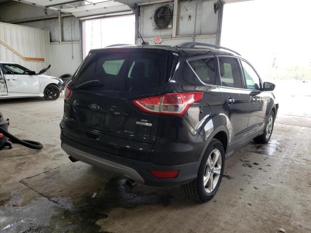 Photo 4 from auction – 2014 FORD ESCAPE SE with VIN 1FMCU0G9XEUD79428