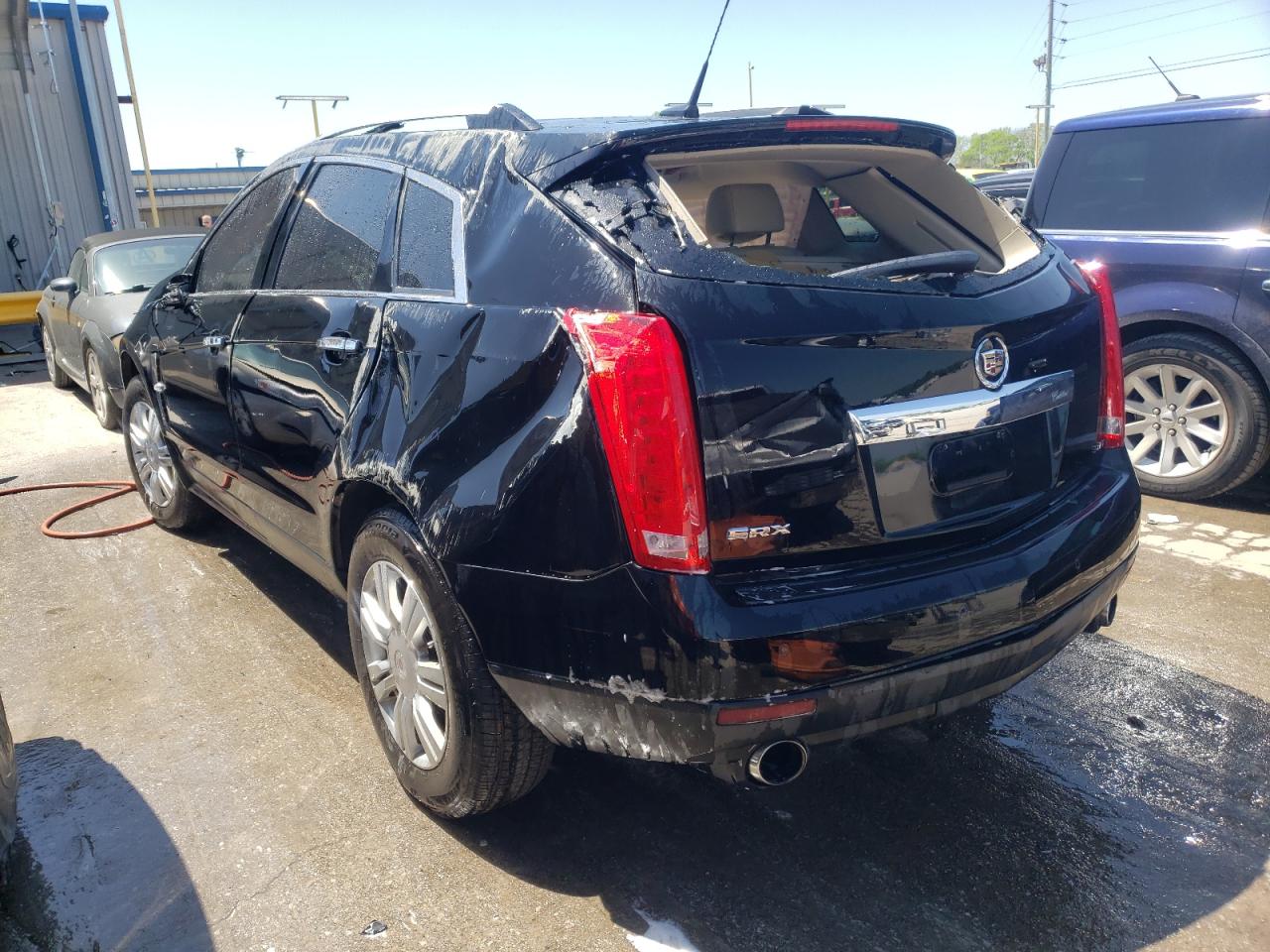 Photo 3 from auction – 2012 CADILLAC SRX LUXURY with VIN 3GYFNAE37CS510180