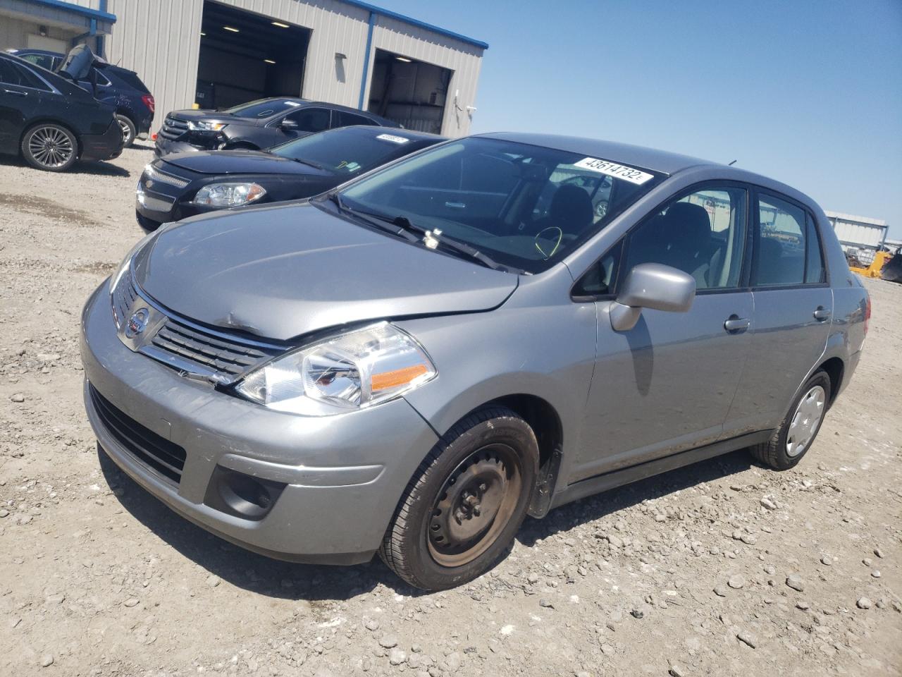 Photo 2 from auction – 2009 NISSAN VERSA S with VIN 3N1BC11E09L499319