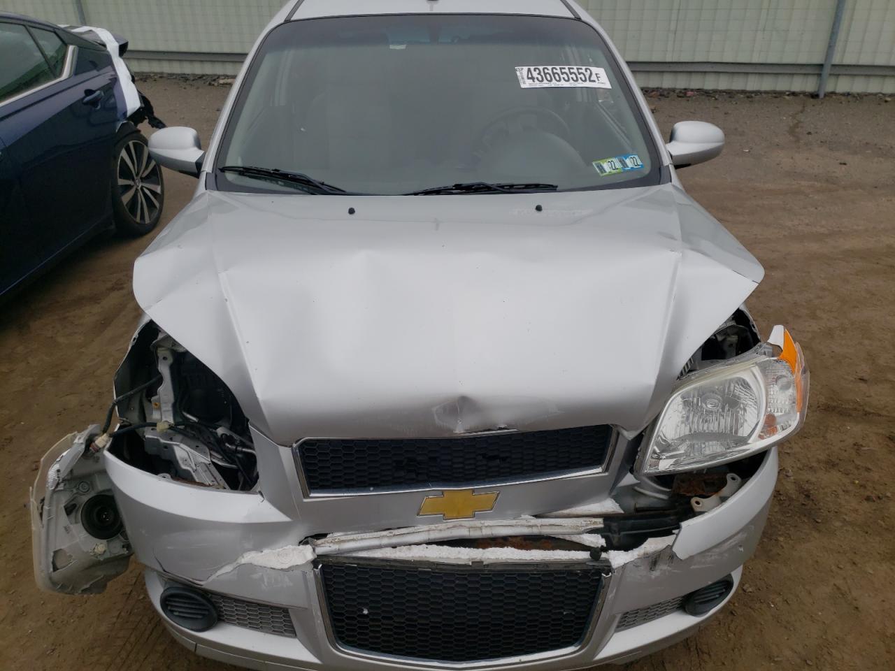 Photo 7 from auction – 2011 CHEVROLET AVEO LS with VIN KL1TD6DEXBB200022