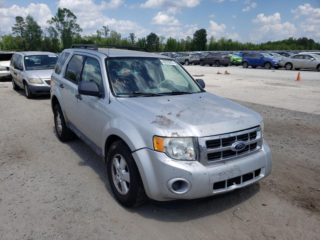 FORD ESCAPE XLS 2009 with VIN 1FMCU02779KB21973 - Photo from auction