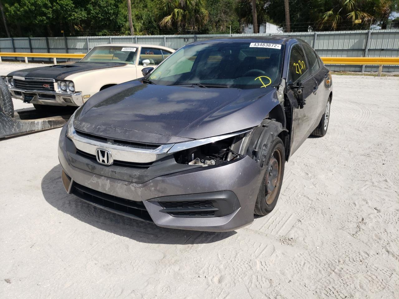 Photo 2 from auction – 2017 HONDA CIVIC LX with VIN 19XFC2F51HE050604