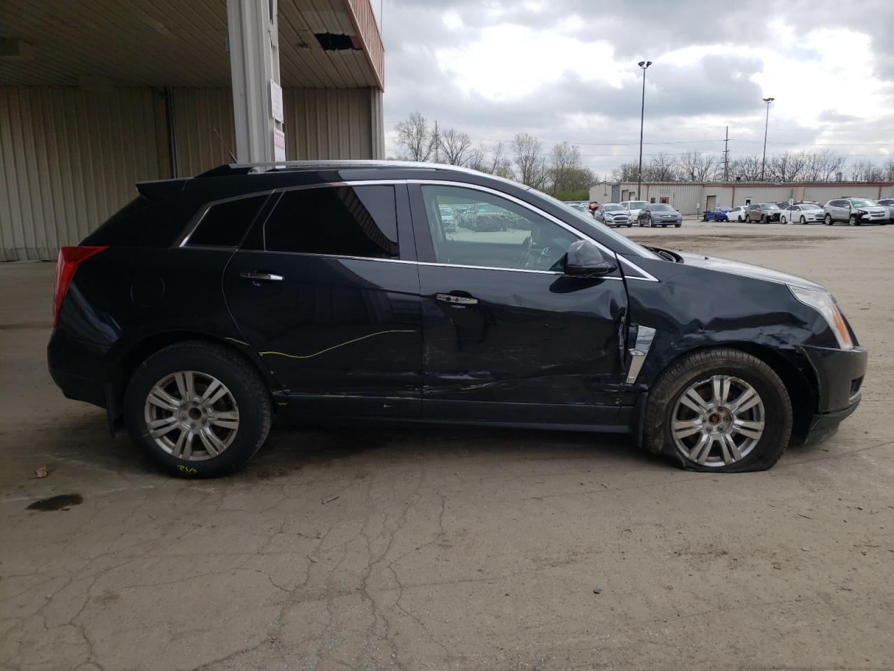 Photo 9 from auction – 2011 CADILLAC SRX LUXURY with VIN 3GYFNAEY3BS678893