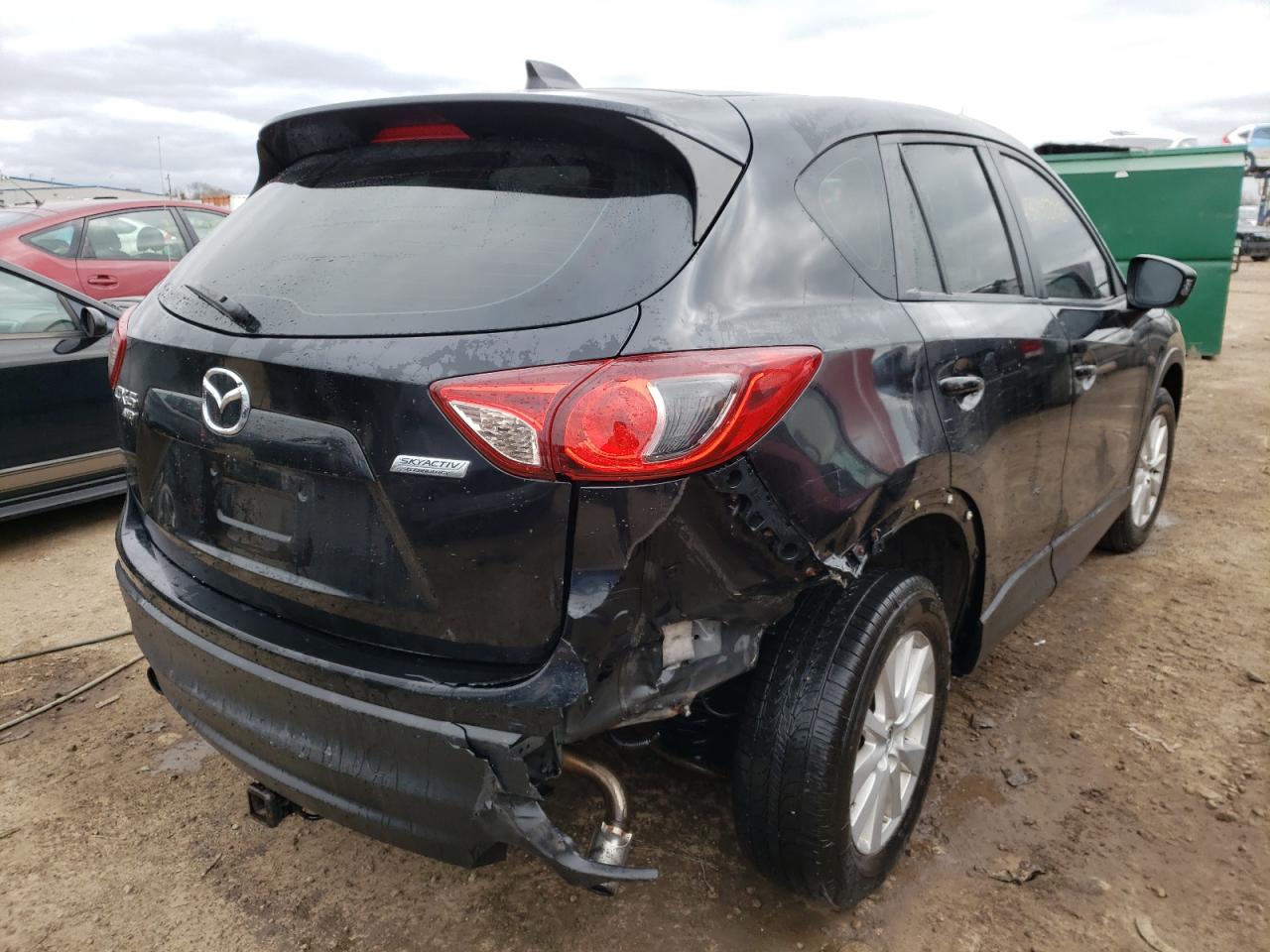 Photo 4 from auction – 2013 MAZDA CX-5 SPORT with VIN JM3KE4BEXD0113574
