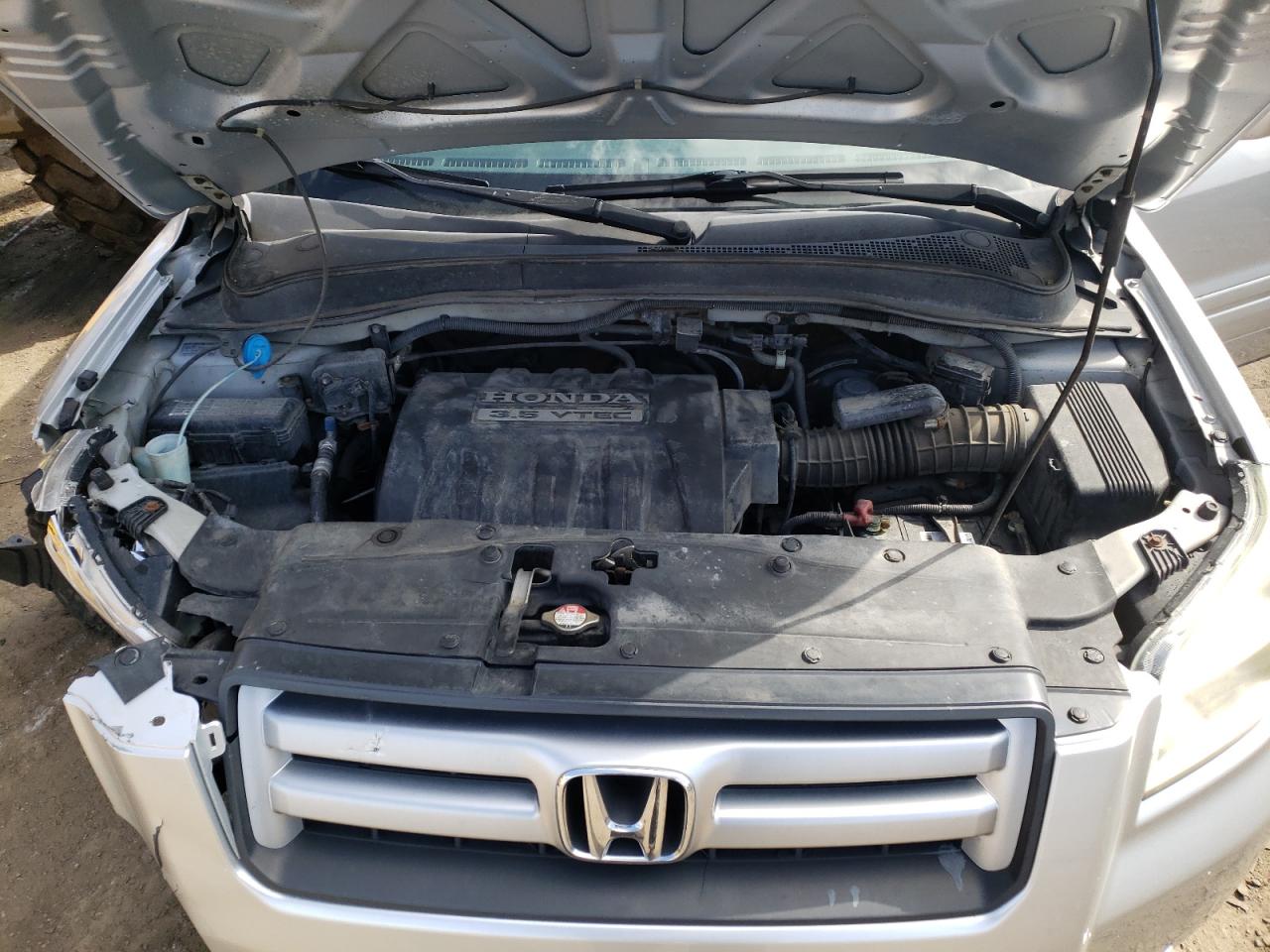 Photo 7 from auction – 2006 HONDA PILOT EX with VIN 2HKYF18666H532686
