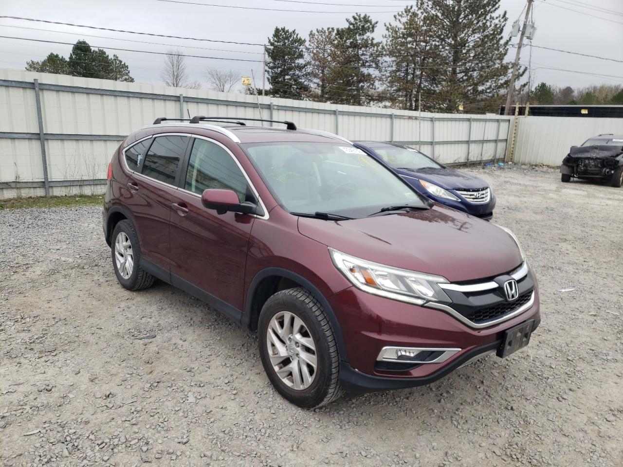 HONDA CR-V EXL 2015 with VIN 2HKRM4H74FH603856 - Photo from auction