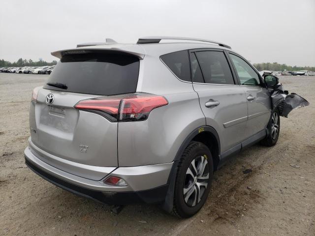 Photo 4 from auction – 2017 TOYOTA RAV4 LE with VIN 2T3BFREV3HW674599