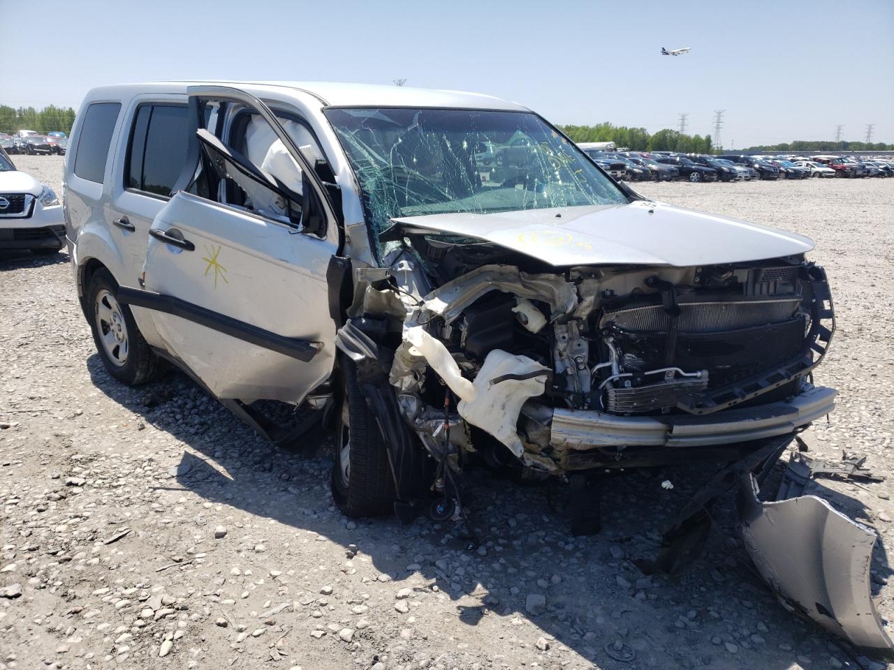 HONDA PILOT LX 2011 with VIN 5FNYF3H2XBB044343 - Photo from auction