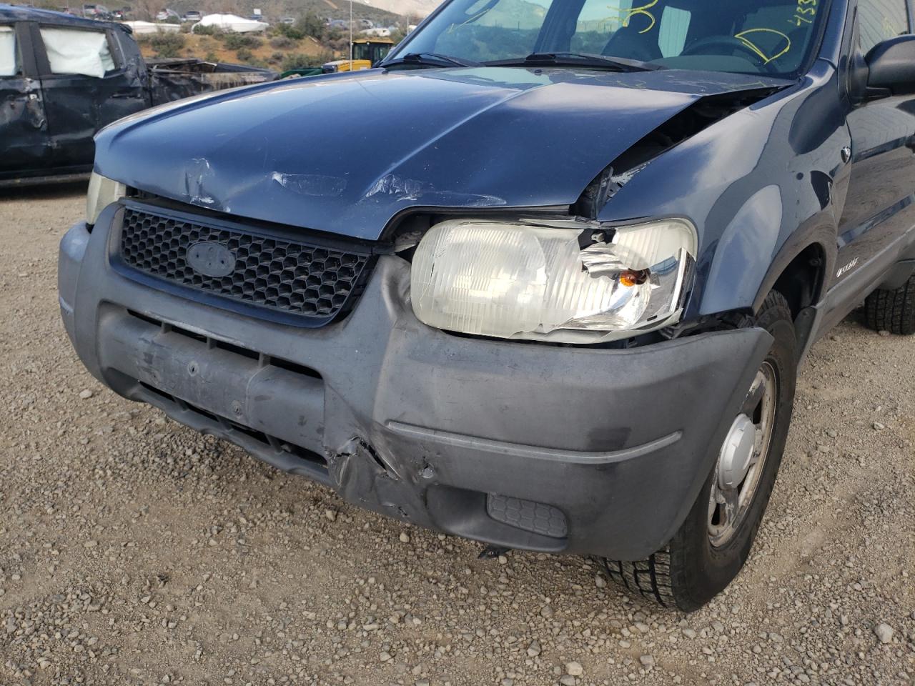 Photo 9 from auction – 2001 FORD ESCAPE XLS with VIN 1FMYU02111KA16478