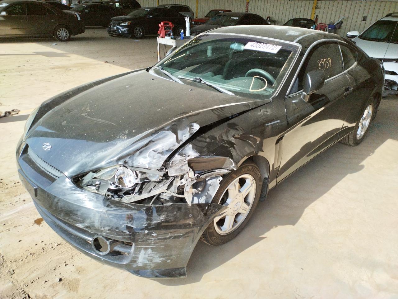 Photo 2 from auction – 2003 HYUNDAI TIBURON with VIN KMHHM65D23U036500