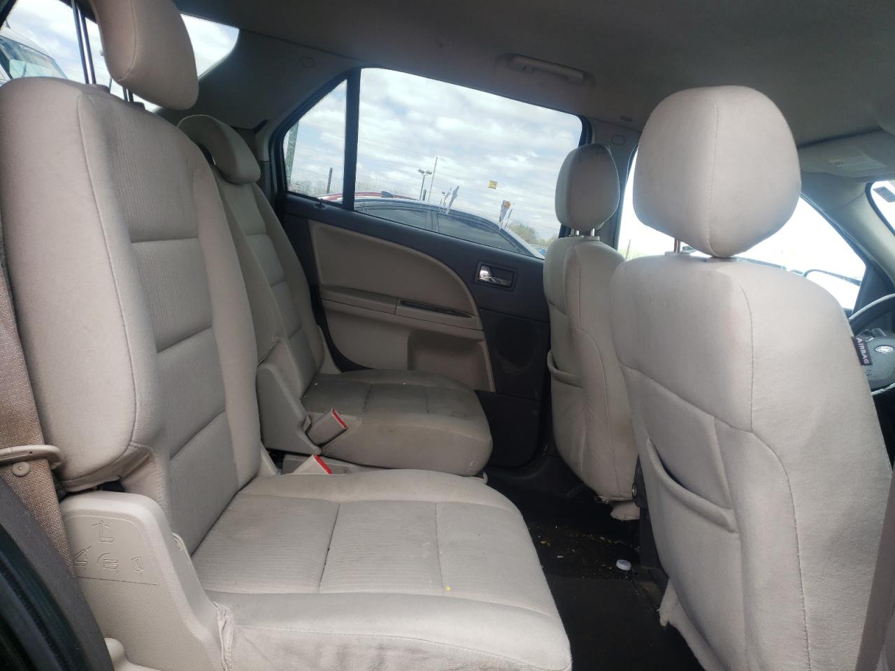 Photo 6 from auction – 2009 FORD TAURUS X S with VIN 1FMDK02W69GA06351