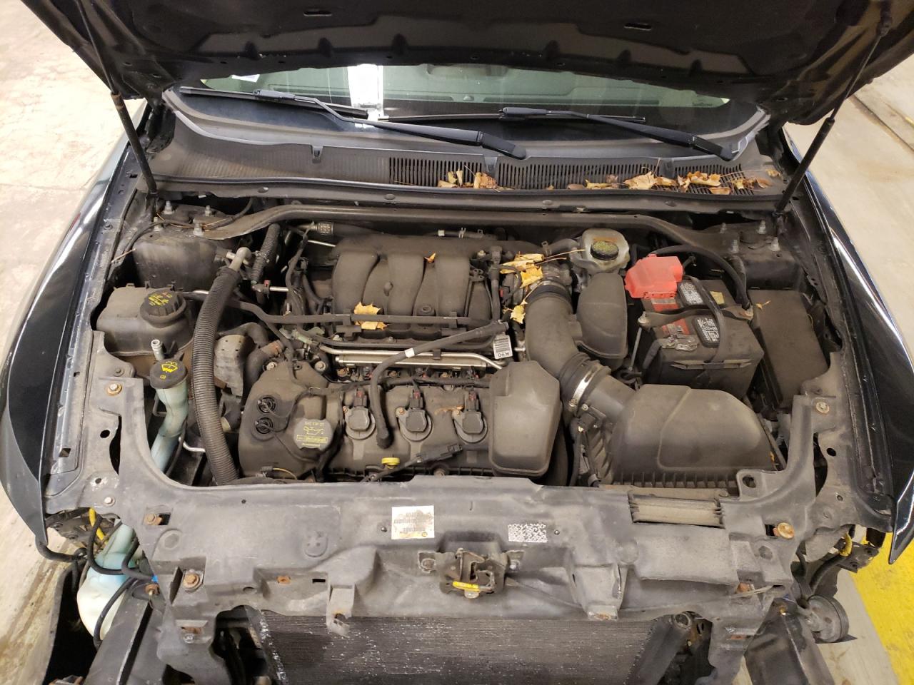 Photo 7 from auction – 2014 FORD TAURUS SE with VIN 1FAHP2D88EG125245