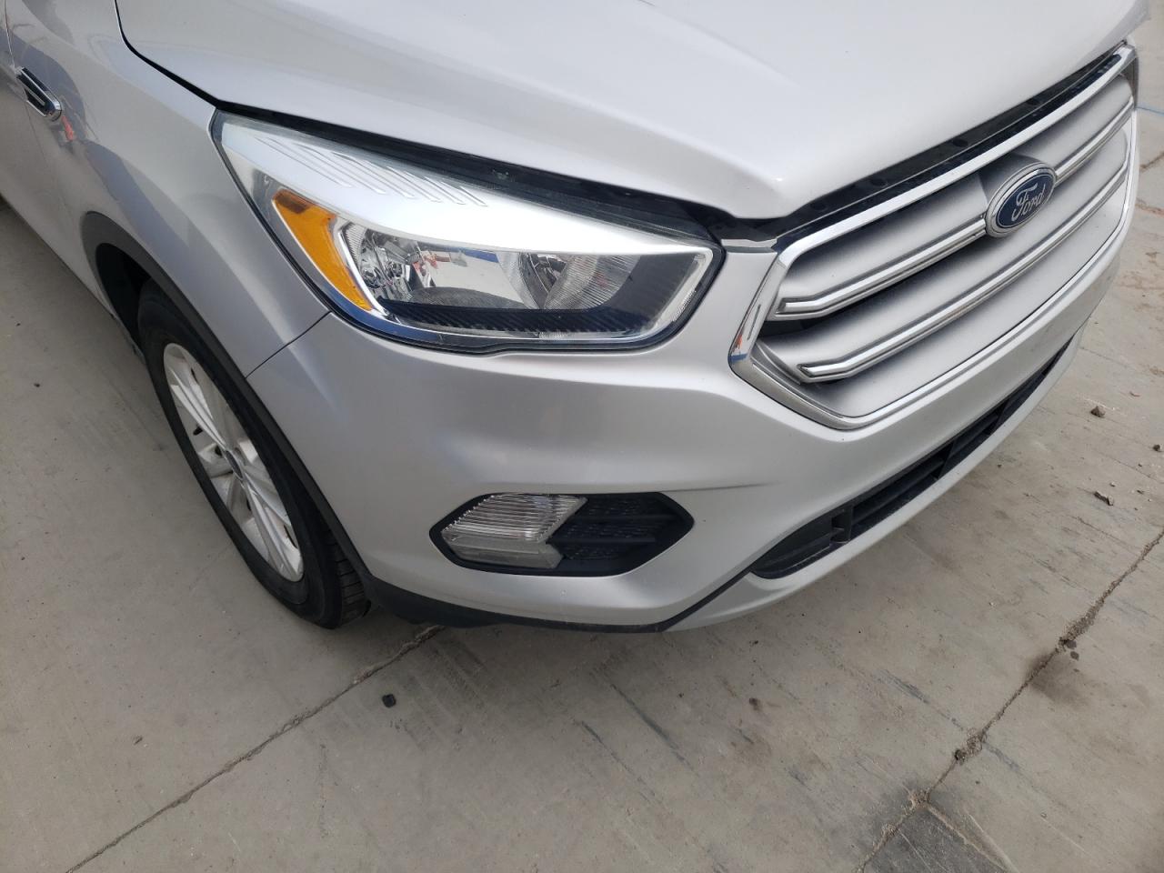 Photo 9 from auction – 2017 FORD ESCAPE SE with VIN 1FMCU9GD0HUC25811