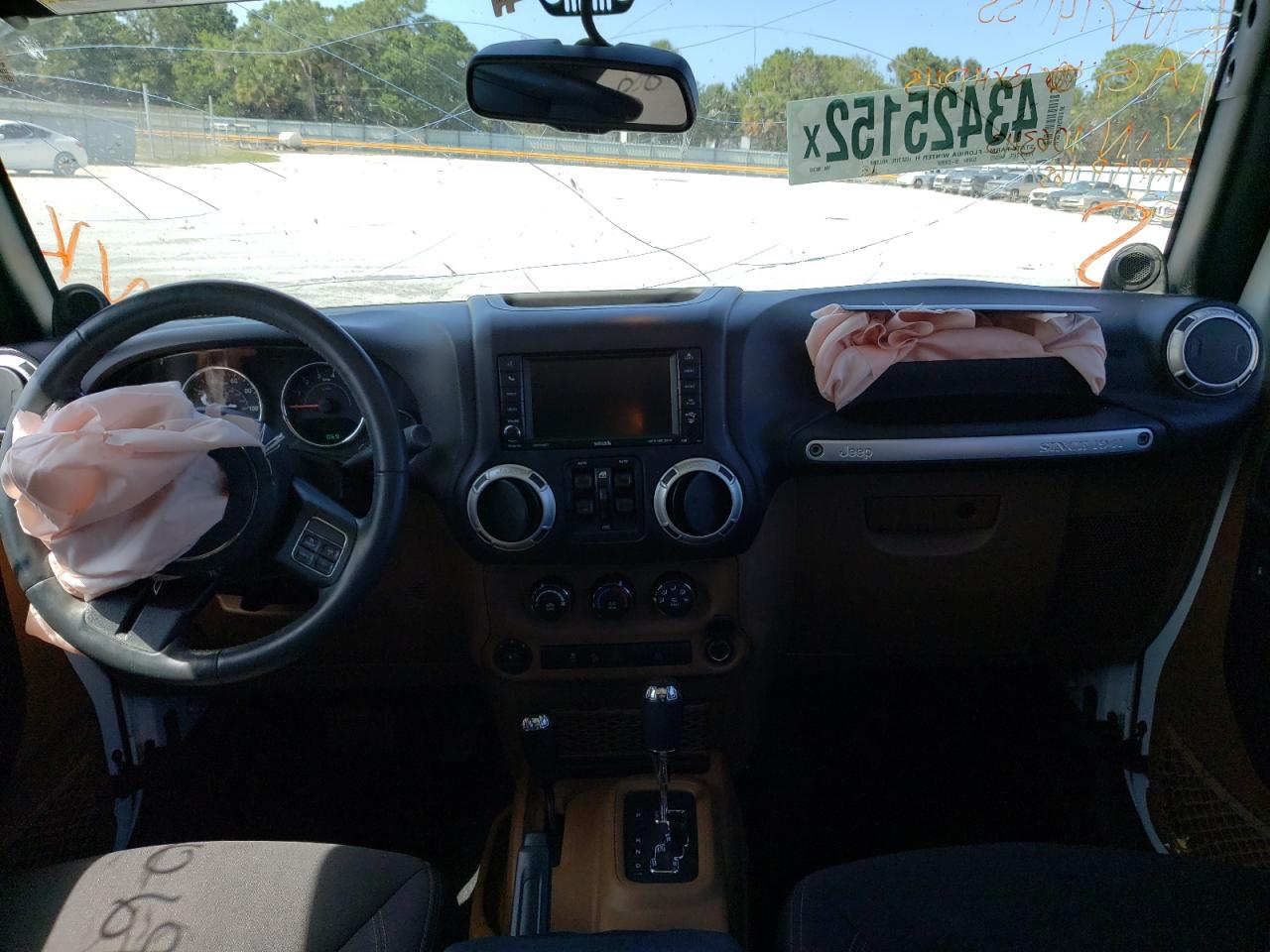 Photo 9 from auction – 2014 JEEP WRANGLER U with VIN 1C4BJWEG4EL106343