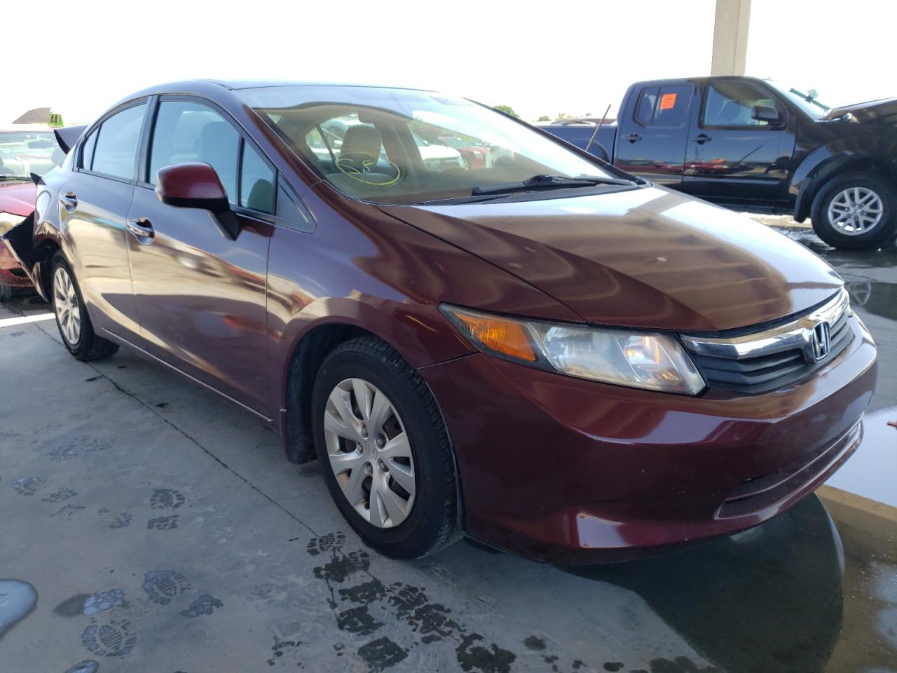 HONDA CIVIC LX 2012 with VIN 2HGFB2F52CH559991 - Photo from auction