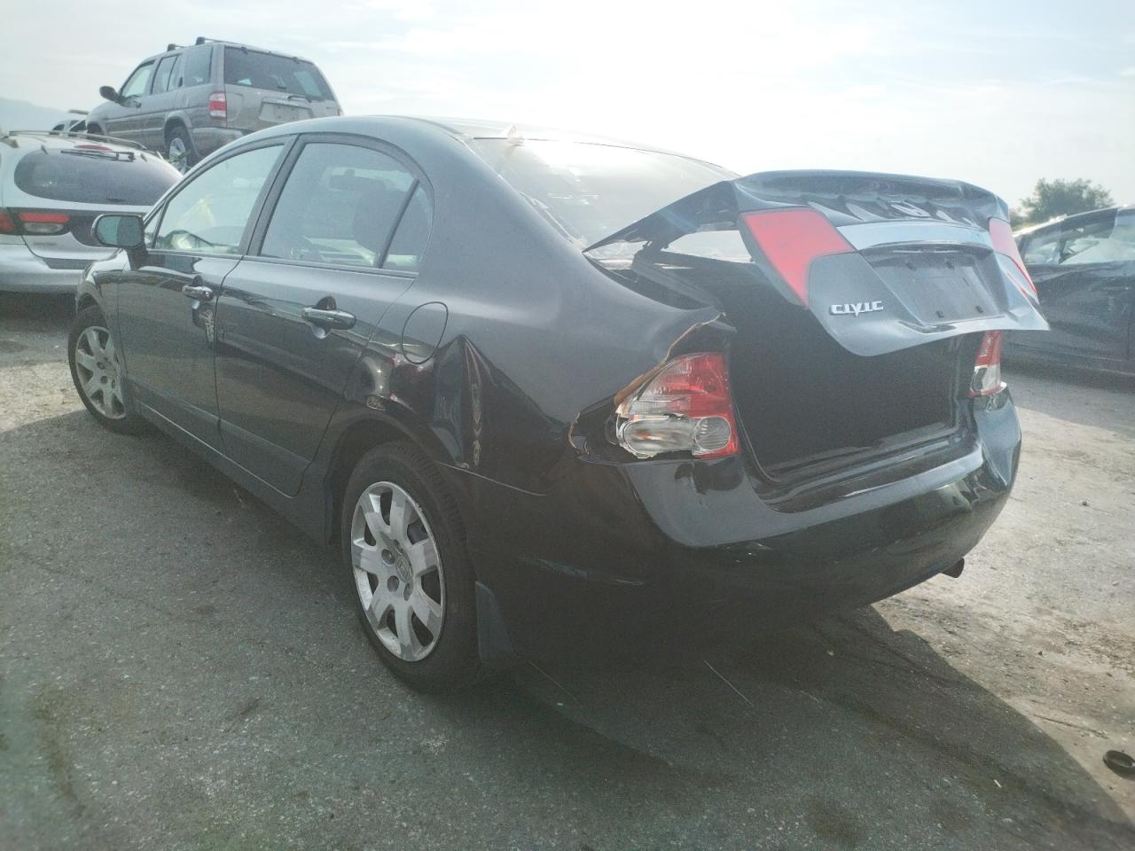 Photo 3 from auction – 2010 HONDA CIVIC LX with VIN 19XFA1F58AE054039
