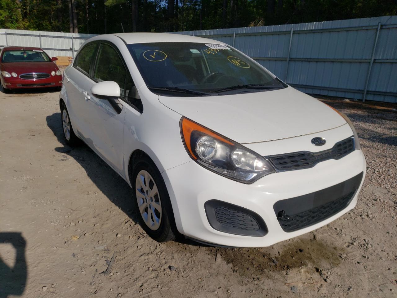 KIA RIO EX 2012 with VIN KNADN5A37C6031141 - Photo from auction