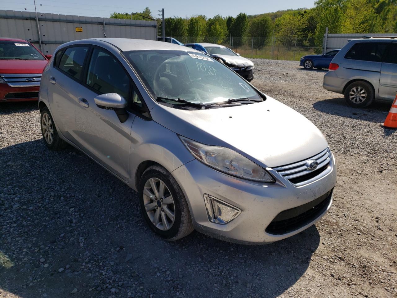 FORD FIESTA SE 2012 with VIN 3FADP4EJ3CM221430 - Photo from auction