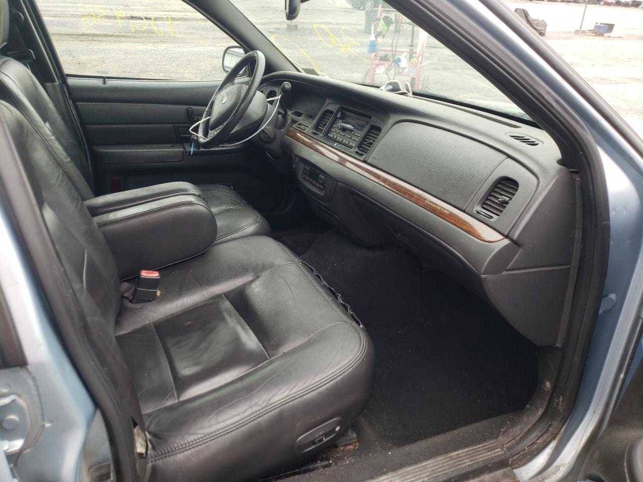 Photo 5 from auction – 2003 FORD CROWN VICT with VIN 2FAFP74W03X141479