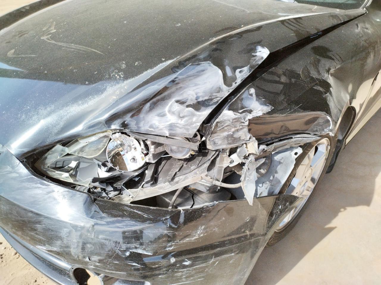 Photo 9 from auction – 2003 HYUNDAI TIBURON with VIN KMHHM65D23U036500