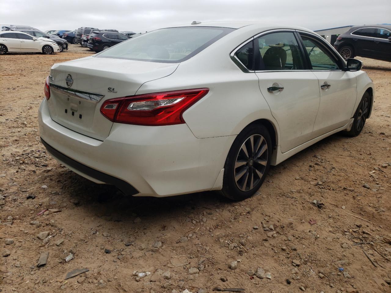 Photo 4 from auction – 2016 NISSAN ALTIMA 2.5 with VIN 1N4AL3AP2GC136671